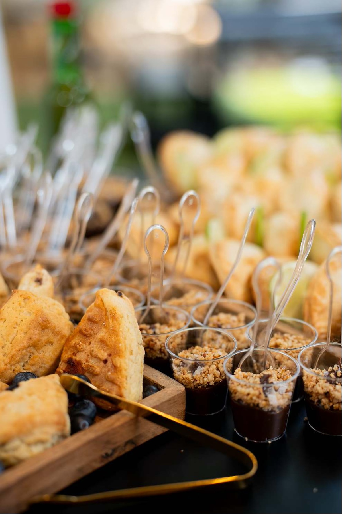 Dessert bar with mini chocolate mousses and scones